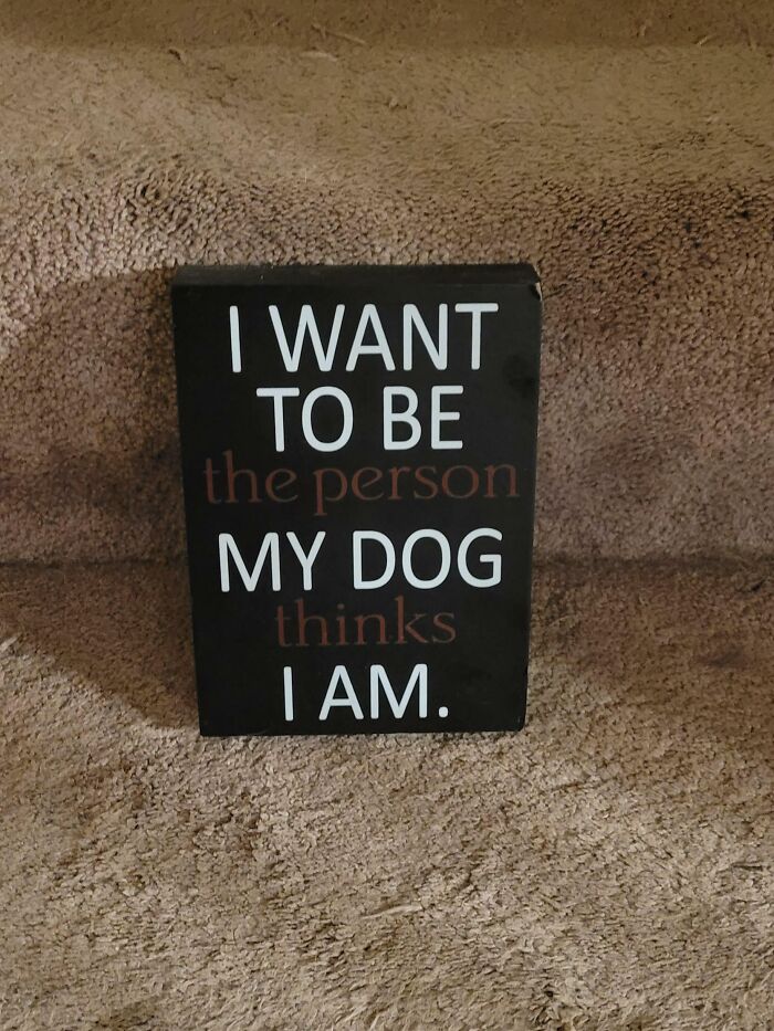 A sign on a carpet Description automatically generated