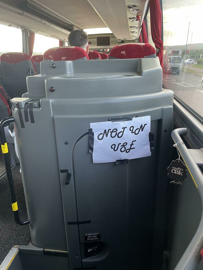 A sign on the back of a bus Description automatically generated