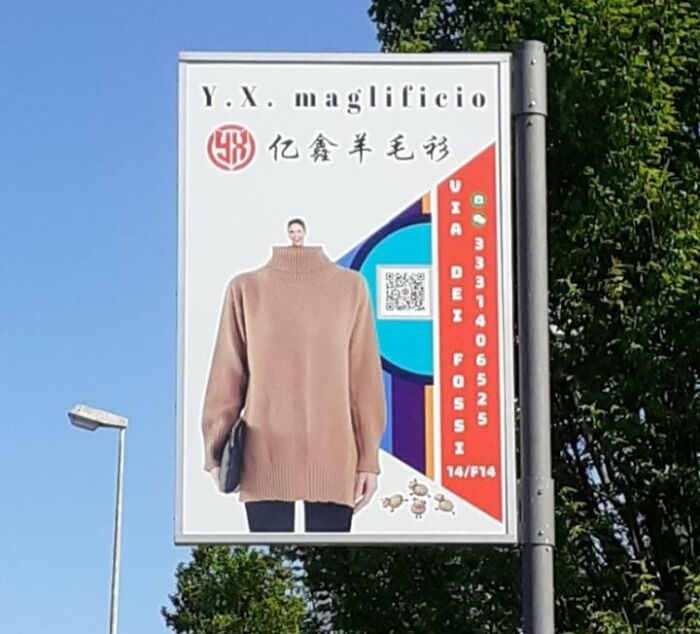 A sign with a picture of a person on it Description automatically generated