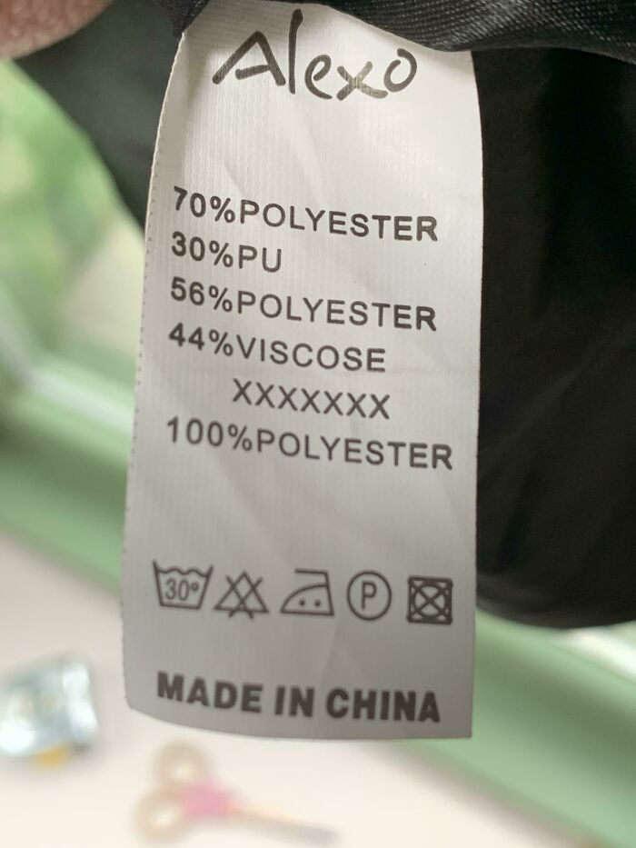 A white label with black text
Description automatically generated